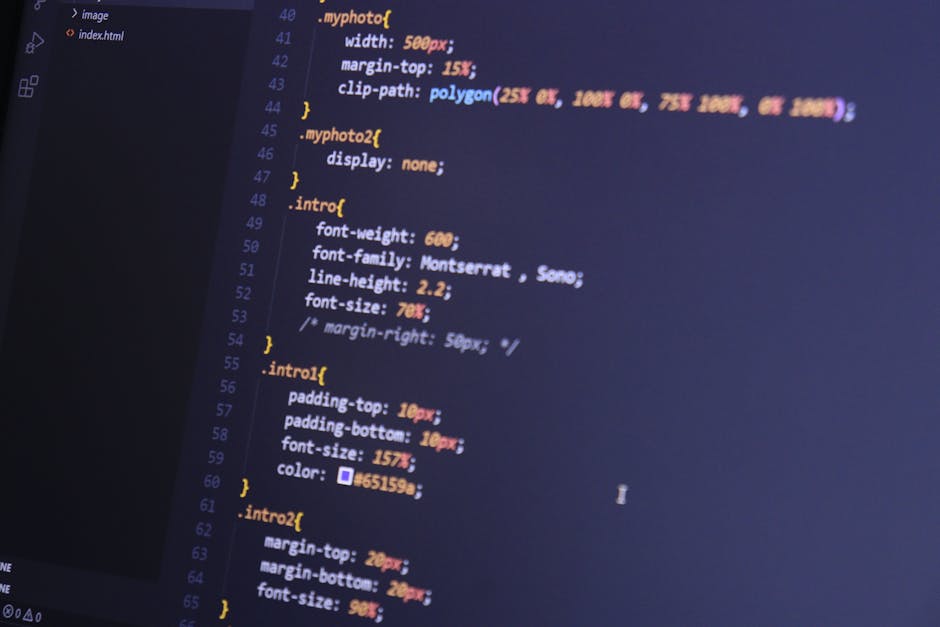 The image shows a close-up of a computer screen displaying lines of CSS code written in a code editor. The code includes various style properties such as font-weight, font-family, line-height, font-si